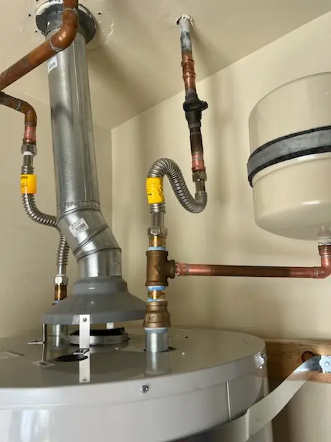 Water heater installation and plumbing repair in Whigville
